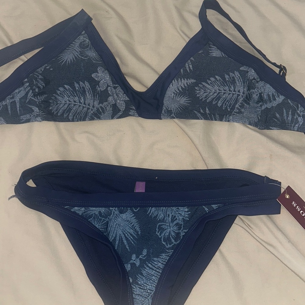 Blue medium two piece bikini, brand new with tags, cut out bottoms